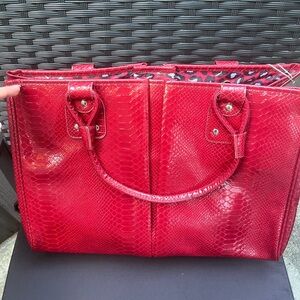 Red large Elizabeth Arden perfume bag